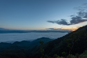 fog and cloud mountain valley landscape on sunrise