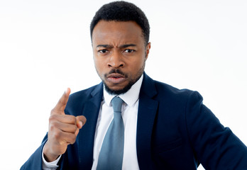 Close up of Angry young businessman boss accusing, blaming or threatening employee