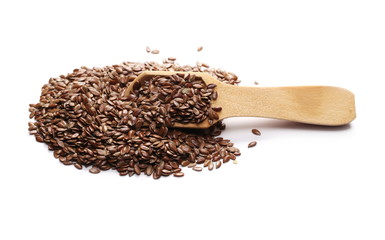 Flax seeds, linseed pile with wooden spoon isolated on white background