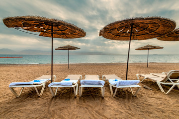 Morning at sandy beach of Eilat - famous tourist resort resort and recreational city in Israel. 