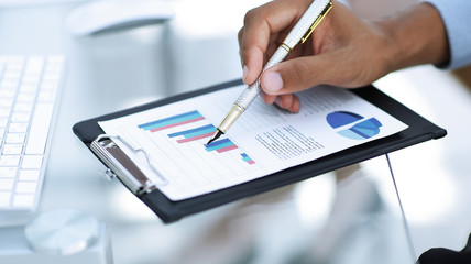 Fototapeta premium closeup.businessman working with a financial schedule. business concept