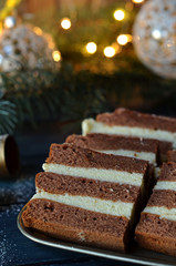 Sliced pieces of gingerbread cake with cream