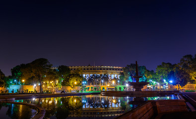 Beautiful view of Indian Parliament House (Sansad Bhavan) at night, New Delhi, India.
