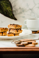 Organic Muesli and Dried fruit bars. Healthy breakfast and snack. White table background.Selective focus