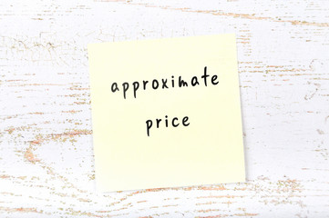 Yellow sticky note with handwritten text approximate price