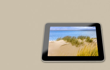 Fototapeta premium Generic Tablet with beach scene on display - 3D Rendering