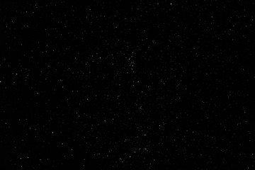  Milky Way. Space filled with stars in the sky.  Surrounded by the mountains.