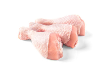 Raw chicken legs isolated on white background.