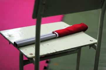 Red and white referee flags at karate competitions.