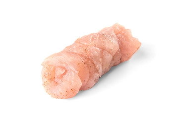 Raw chicken rolls isolated on white background.