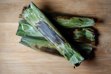 Pulut Panggang grilled glutinous rice wrapped in banana leaf stuffed with savory fillings