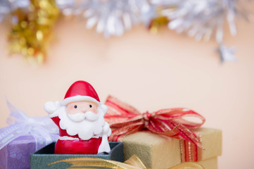 santa claus doll christmas background and gift box and copy space