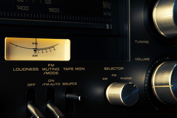 Vintage hi-fi receiver.Meloman technician.Volume control knob.High quality system.Audio equipment for record studios.Vacuum tubes amplifier.