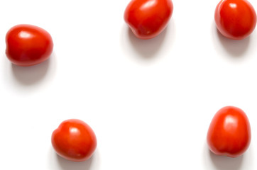 Fresh tomatoes isolated on white background.