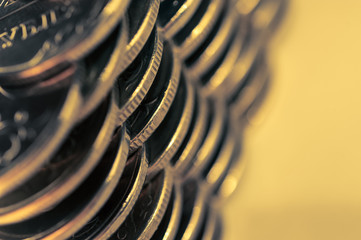 Stack of golden coins macro. Rows of coins for finance and banking concept. Economy trends background for business idea.