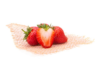 Ripe strawberries from the garden, put on a mat separately on a white background.