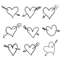 Set of hand drawn doodle hearts with arrows. Valentine's day design elements. Hand written greetings.