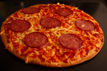 pizza on the pan in the oven
