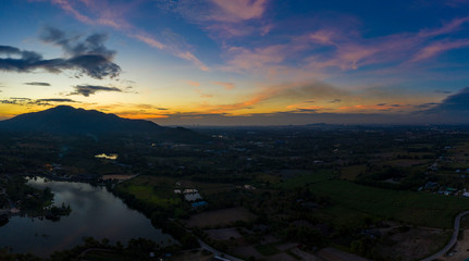 Aerial view. of sunset or sunrise and blue sky on the mountains Twilight sky.