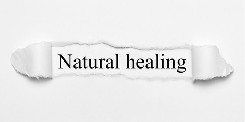 Natural healing on white torn paper