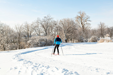 Fototapeta na wymiar A man practicing nordic skiing in winter season