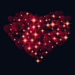 Abstract design -   heart with glowing sparkling particles  on a black background.