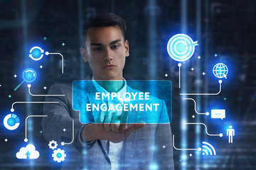 The concept of business, technology, the Internet and the network. A young entrepreneur working on a virtual screen of the future and sees the inscription: Employee engagement
