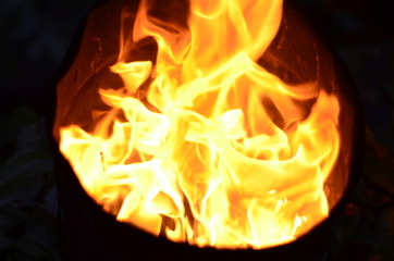 dancing flames in a tin