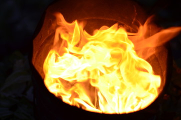 dancing flames in a tin