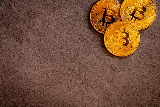 Bitcoins on concrete table. Cryptovaluta, cyber transaction, technology concepts.