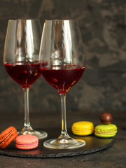 red wine, transparent glass (beverage and a note with a heart). top copy space