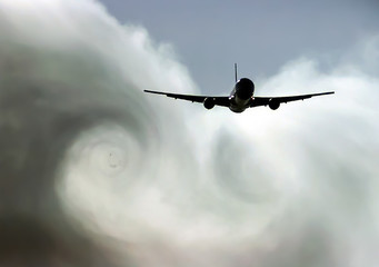 The turbulence of the clouds left by the plane during - obrazy, fototapety, plakaty