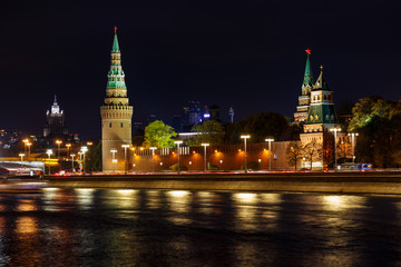 Fototapeta na wymiar Towers of Moscow Kremlin at night with illumination. City landscape