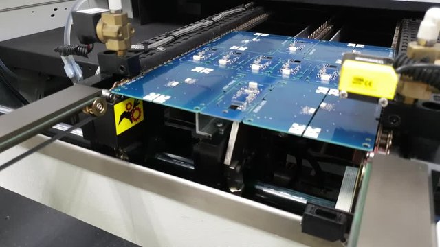 printed circuit board enters the reflow oven and is ready to be cooked