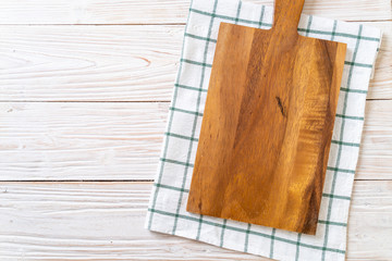 Naklejka na ściany i meble empty cutting wooden board with kitchen cloth