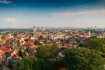 Fototapeta na wymiar View of Belgrade and Zemun in Serbia from Gardos Tower, panorama of the Danube River with Veliko Ratno Ostrvo in the background in summer