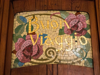 written good trip, made in mosaic, in the north station in Valencia, Spain