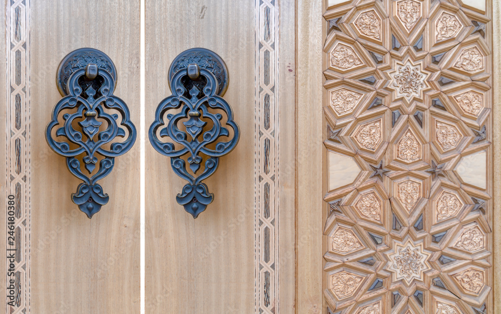 Wall mural Details of a fine wood carving art on the door an Islamic art and craft, Ankara, Turkey