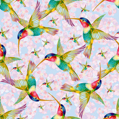 Flying hummingbird and light flowers. Seamless background pattern