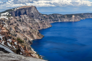 A Steep Cliff Line Guards the Waters of Crater Lake in Oregon
