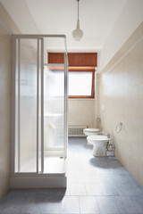 Fototapeta na wymiar Simple bathroom in old apartment interior