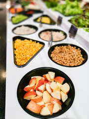 Salad bar; vegetable, fruit, and salad sauce