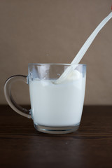 pouring milk into glass