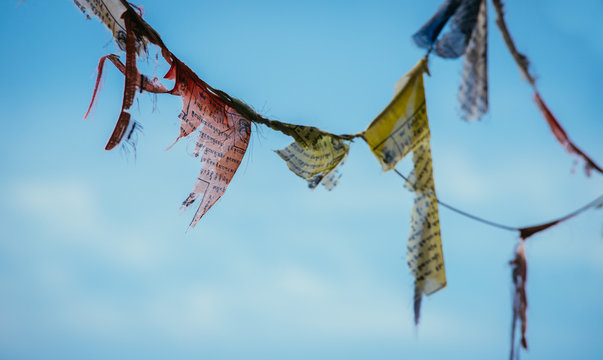 Tibetan prayer flag, blue sky