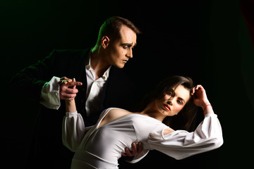 Making your heart flutter. Mime man and woman act in romantic scene. Couple of mime artists perform...