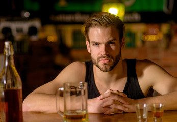 I like to go to pubs. Man drinker in pub. Addicting to alcoholic drink. Handsome man drink beer at bar counter. Alcohol addict with beer mug. Beer restaurant. Alcohol addiction and bad habit