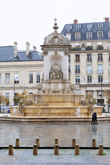 Fototapeta na wymiar Paris (France) - Place Saint-Sulpice and the Fontaine des Quatre Points Cardinaux