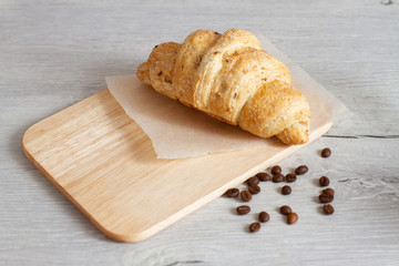 croissant on wooden table