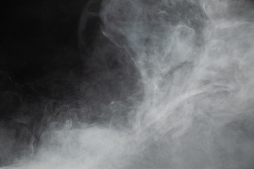 Fototapeta na wymiar dense smoke on black background