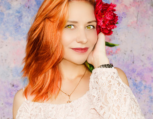 portrait of a girl with red hair and red peony